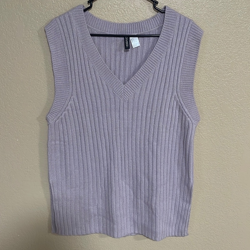 divided sweater vest